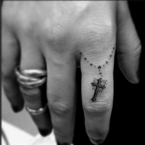 See more ideas about tattoos, finger tattoos, small tattoos. Rosary. Clean. | Finger tattoo for women, Finger tattoo ...