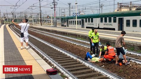 A man is dead after he was hit by a train. Italians shocked by man's selfie after train accident in ...