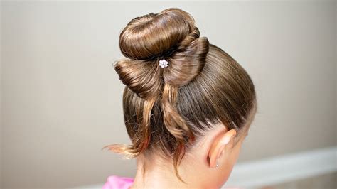 This is the ultimate way to successfully get your hair easily. HOW TO CREATE A BOW BUN - DONUT BUN TUTORIAL - YouTube