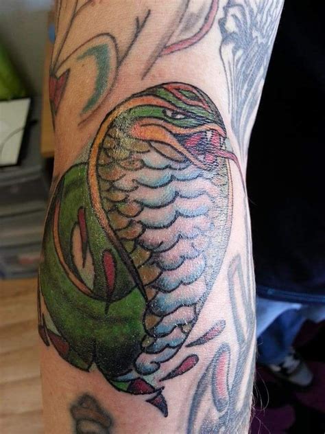 Every tattoo or 'flash' is a personal statement but there are certain common meanings. Traditional Style Cobra Tattoo by Michael Thomas | Cobra tattoo, Tattoo artists, Tattoos