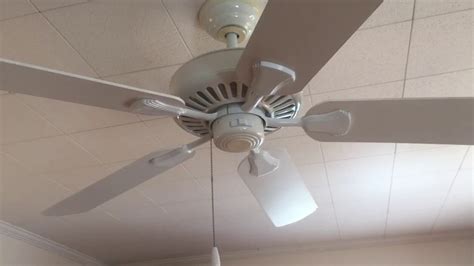 Loosen the two screws in the collar on top of the motor. Hampton Bay Cameron II ceiling fan - YouTube