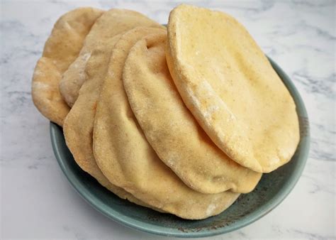 You'll find my homemade pitta bread recipe below, i made 12 pittas so that when i was researching how to make pitta breads i found and read many recipes from all over the place, but i liked the. Pitta Bread Recipe : Easy Pita Bread Recipe Recipe Pitta Bread Recipe Pita Bread Recipe Bread ...