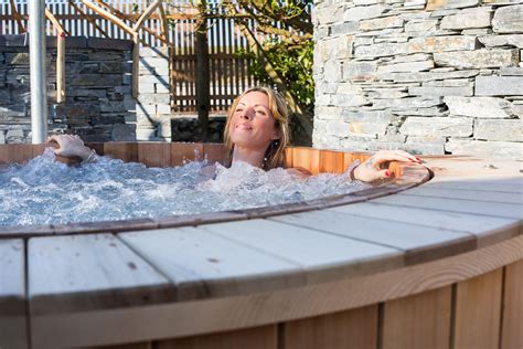 The bathtub is designed so that water never remains in the lines of the whirlpool jets or the. Wooden Barrel Hot Tub Installers | Hot tub garden, Hot tub ...