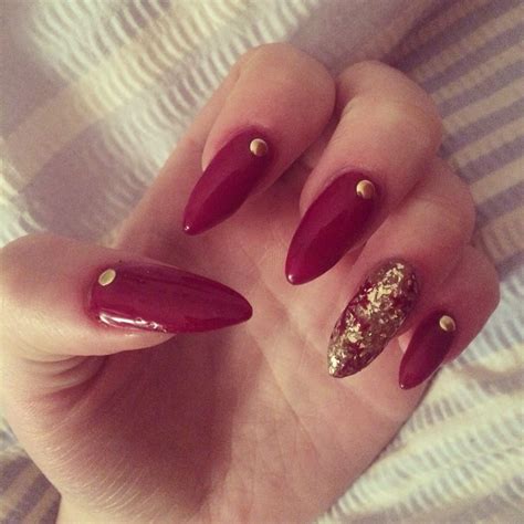 Start off by painting your nails brown, except for the ring finger. Simple maroon/burgundy and gold glitter Christmas nails ...