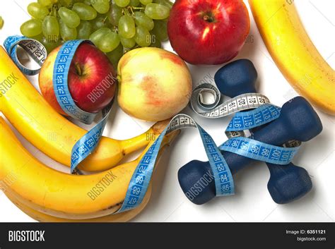 Healthy lifestyle concept with food in heart and sports fitness accessories. Healthy Lifestyle Image & Photo (Free Trial) | Bigstock