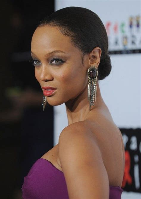 Okay, technically a ponytail not a bun, but for those growing their hair, this is a great style to choose. Tyra Banks Bun Updo for Thin Hair | Updo, Buns and Black women