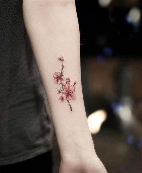 Beautifuldelicate watercolor cherry blossom forearm tattoo. Cherry blossoms tattoo by Alex inked on the left forearm ...