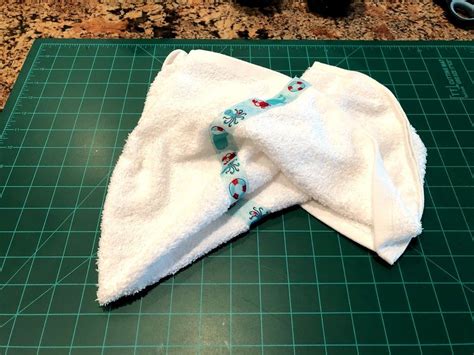 Flip the whole towel over so that you are seeing the inside of the towel. Sew a Hooded Towel for Baby the Easy Way! | Hooded baby ...
