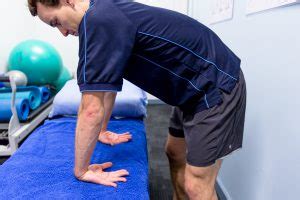 Check spelling or type a new query. Wrist Flexor Stretch Standing (1) - Physio Pro