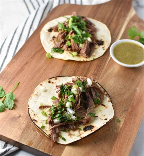 Scrape cooking grates clean, then place flank steak over hot side of grill. Instant Pot Steak Tacos | The Dizzy Cook