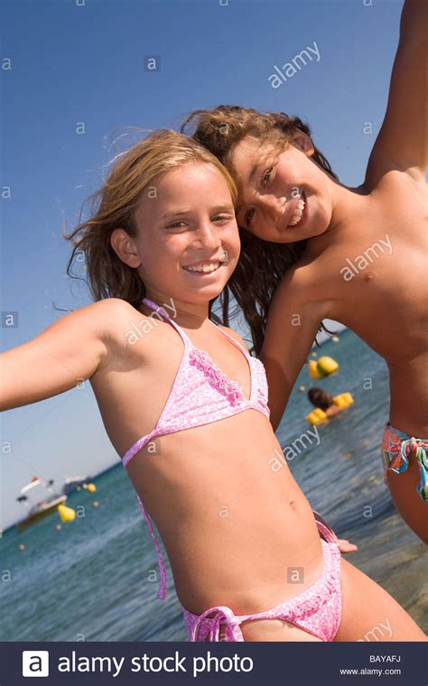 We also work directly with many of the cybercrime divisions of the word to safeguard the rights of our users. Pretty children playing and having fun on the beach. Plage ...