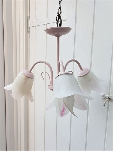 This post contains affiliate links for your convenience. Vintage pink flush ceiling light fixture with 3 white ...