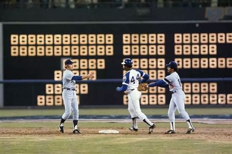 Braves season tickets may also be available. Hank Aaron is congratulated by infielders Bill Russell ...