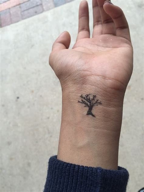 Small arrow tattoo on fingers: Small Tree Tattoo On Wrist - CreativeFan