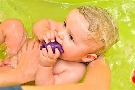 Newborn to 6 months you are free to bathe your newborn two or three times a week after the umbilical cord stump has healed completely, dried up, and fallen off. How to Bathe a Newborn: 12 Steps (with Pictures) - wikiHow