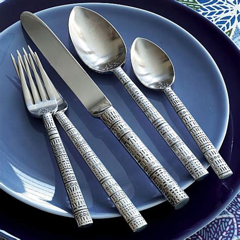 Position the machine on the table so you have decent leverage against the slant with the position you want the tube grip to move towards facing downward. Tattoo Flatware by Lisa Jenks