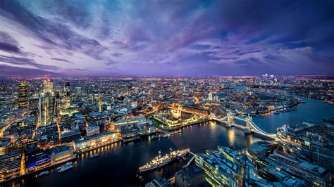 All that he needs for life is a helm and an airplane. London Night Lights Aerial 4K Desktop Wallpaper