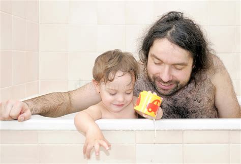 I sewed up a few new bathing suits for my kids before our spring break trip. Father Bathing Together With His Baby-boy Stock Image ...