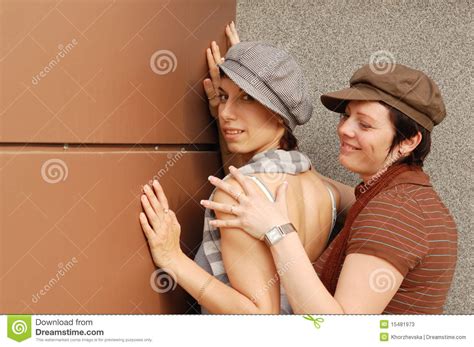 Young Women Embracing Stock Photos - Image: 15481973