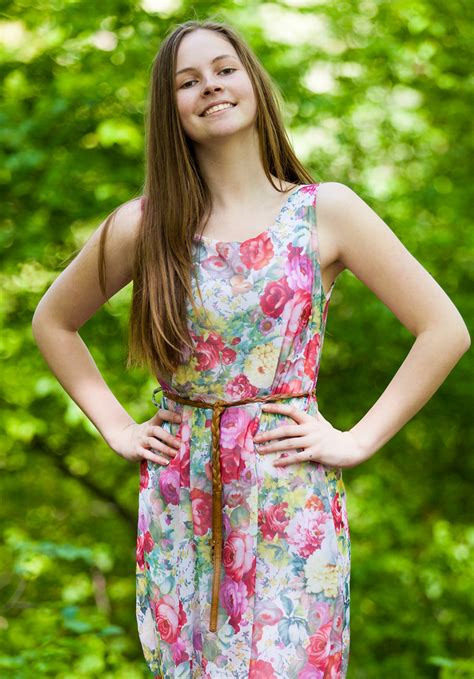 Beautiful young woman at swimming pool. Photo of an amazingly photogenic 13-year-old girl ...