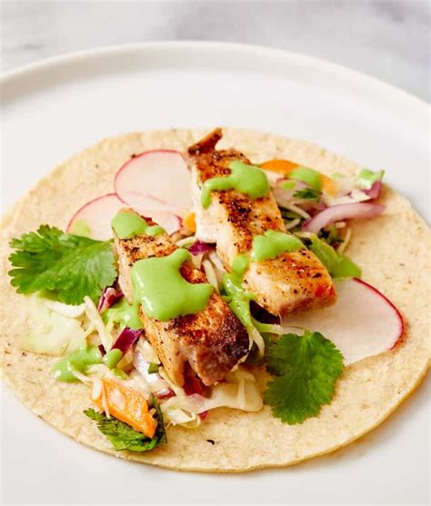 Fish tacos will forever remind me of living in mexico. Easy Fish Tacos with the BEST Fish Taco Sauce « Clean ...