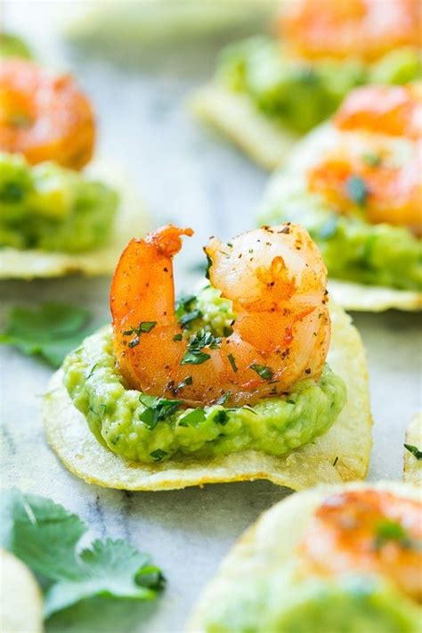 Spread a thin layer of black beans on each tostada and sprinkle with cheese. Mexican Shrimp Bites - Dinner at the Zoo | Super easy ...