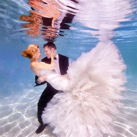This incredible picture of newlyweds kissing underwater in apopka, florida was a dream come true for. These Underwater Wedding Photos Are Beyond-Words Stunning