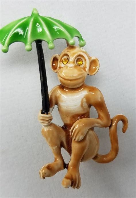 Shasta smith's vintage monkey specializes in precision vintage motorcycle restorations and engineering. Vintage Monkey with Umbrella Pin Enamel on Metal | Etsy ...