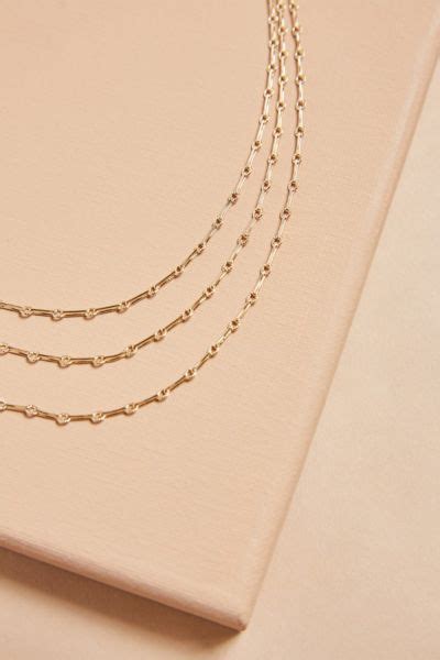 Hit the tweet button at the top ↑ 2. THIRTY-NINE 42 Elli Triple Strand Necklace