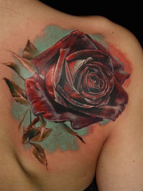 One of the reasons why most women are attracted to rose tattoos is because they were being proposed with this particular flower. realistic rose tattoo by Laura Juan - Design of TattoosDesign of Tattoos