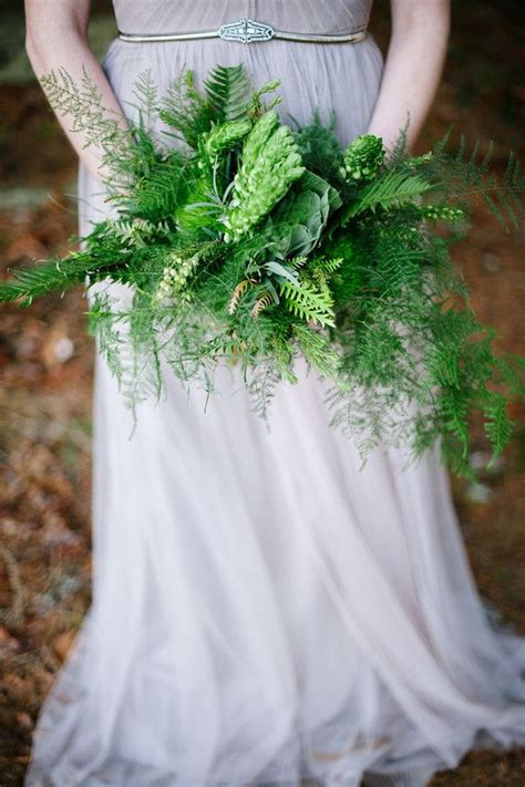 The rockabilly inspired wedding bouquet is created with so many different elements. rustic woodsy green bouquet (With images) | Green bouquet ...