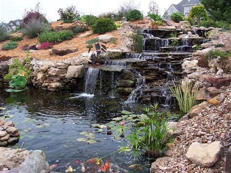 This large focal point will enhance the look. DIY Ponds And Fountains | Fountain Design Ideas