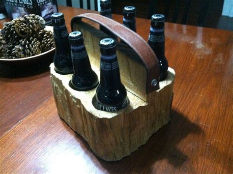 This is a great project that is easy to create a lot of fun and draws attention at bbq s or in the man cave. Beer Tote | Beer wood, Wooden beer holder, Firewood rack plans
