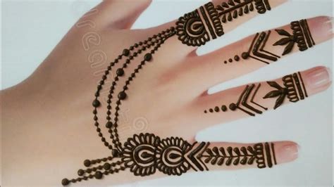 Innovativeness and power of accomplishing something will bring out something remarkable and when will you draw. Easy & Simple jewellery style back hand mehndi design ...