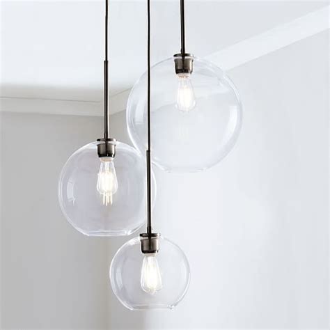 In a range of finishes, it's just the thing to add illuminating intrigue to your hallway, entryway or dining room. Sculptural Glass 3-Light Round Globe Chandelier, S-M-L ...