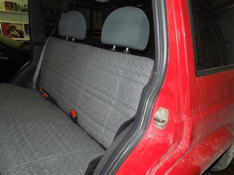 The absolute greatest thing a sexually active male with a drivers licence and a car can wish for. Rear seat WJ head rest mod - Jeep Cherokee Forum