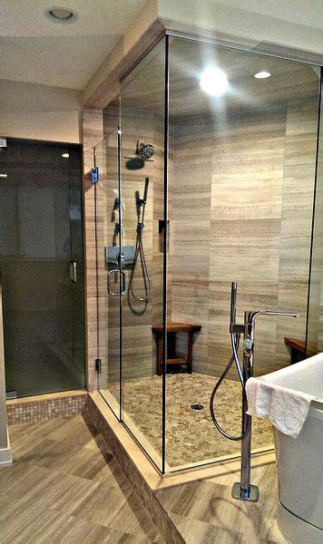 Black shower trays quadrant corner sizes 800 or 900. Corner frameless shower unit with door and fixed panels.