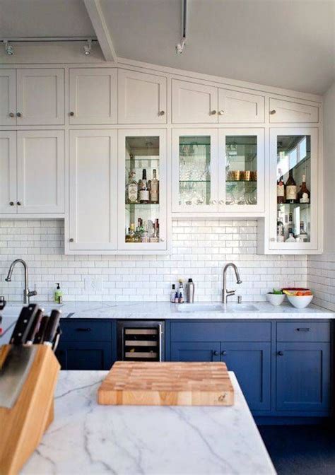 They add depth and dimension while playing well with stark white and other neutral tones. 30 Gorgeous Blue Kitchen Decor Ideas - DigsDigs