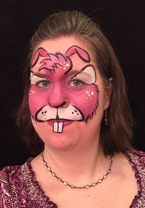 Aside from the spiritual significance of easter, fluffy bunnies and egg hunts are my absolute favorite however, my kids are terrified of grownup sized bunnies with neckties and baskets (who could blame. Pink Rabbit Face Paint | Face painting, Face paint, Pink rabbit