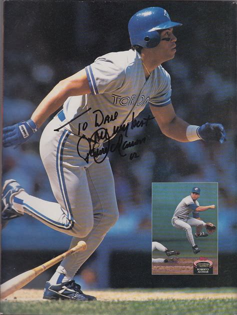 The toronto blue jays' roberto alomar watches a home run sail over the right field fence in 1992. Daily Autograph: Roberto Alomar