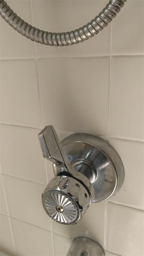 Press the replacement tile down into the gap left by the broken tile. bathroom - how to replace leaking tub/shower faucet stem ...