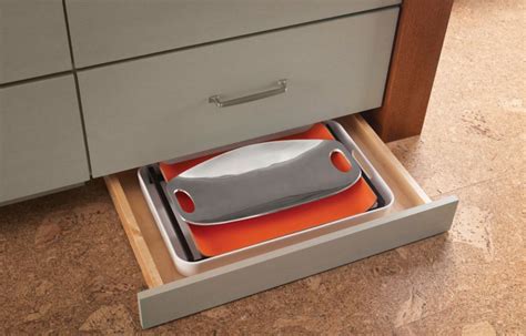 Don't overlook the toe kick. Cabinets of the Desert - Toe Kick Storage