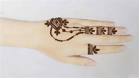 The lotus grows from its roots in the mud toward light and the sky, breaking the water's surface to open in a long. 15 Best Mehndi Tattoo Design for hands 2020 Latest Images ...