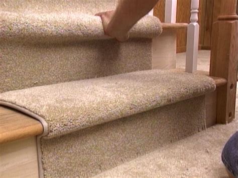 Though carpeting stairs requires a bit more attention to detail than carpeting a flat surface attach the carpet to the tack strips on either side of the step with a knee kicker by holding the carpet in lay out the carpet to cover the thread of the step, then tack it using the knee kicker. How to Install a Carpet Runner on Stairs | HGTV