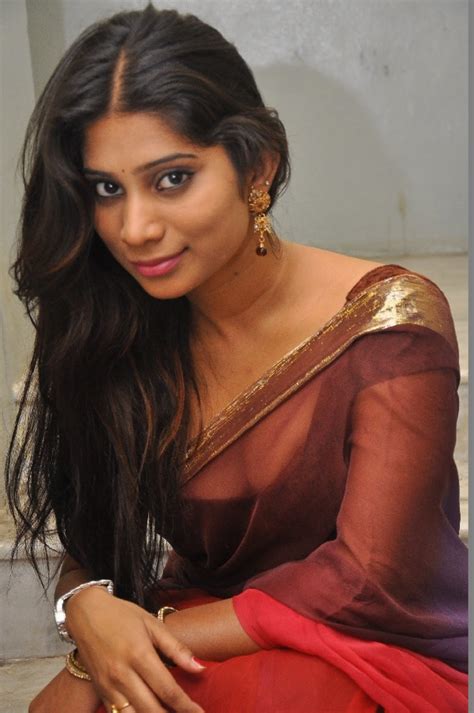 Shriya saran hot cleavage show pics in low cut sleeveless blouse and transparent saree. Midhuna Waliya Hot Cleavage Show Photos in Transparent ...