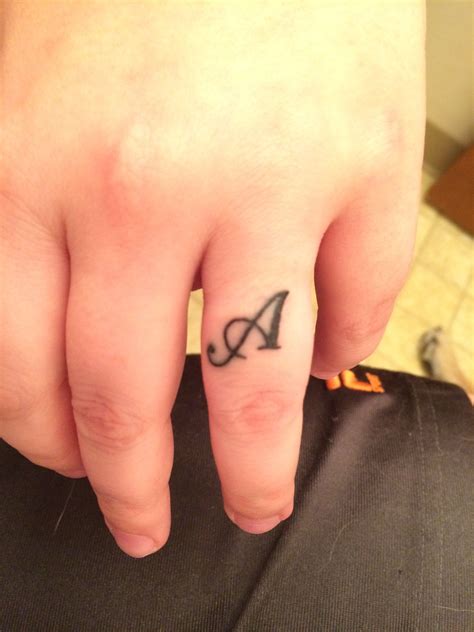 They really don't have a name yet but we've decided to… Husband's initial on ring finger 2nd tattoo on 6/1/16 ...