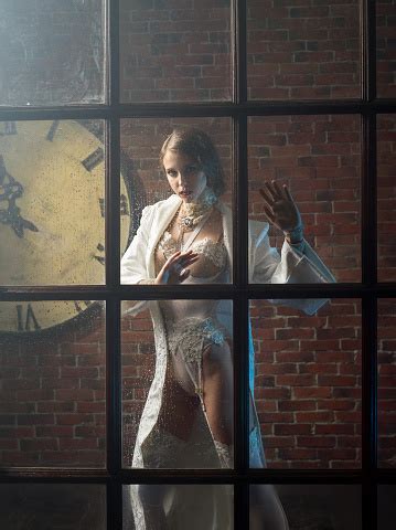 The woman in the window год выпуска: Image Of The Beautiful Woman In A Window Stock Photo ...