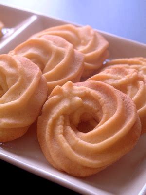 Hold the pastry bag perpendicular to an ungreased baking sheet and pipe stars or rosettes, with the tip almost touching the sheet. Piped Butter Cookies Recipe | Cookie recipes, Butter ...