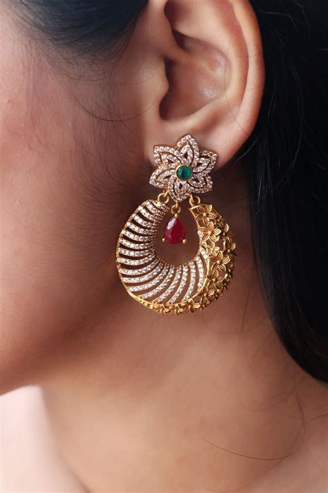 In rhetoric and composition, imitation is a classic exercise in which students read, copy, analyze, and paraphrase imitation in rhetoric and composition. Imitation Floral Light Weight Earrings - South India Jewels