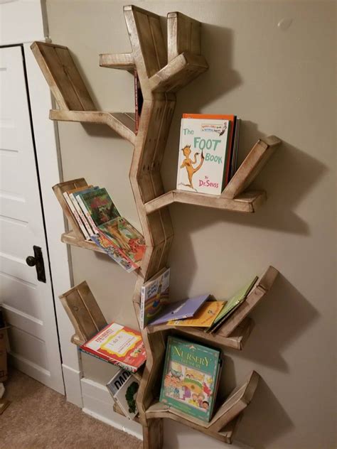 The nursery works tree bookcase is a fun and safe way to arrange your little ones books, stuffed animals or other knick knacks. Tree Bookshelf, Rustic Bookshelf, Rustic Tree Shelf, Tree ...